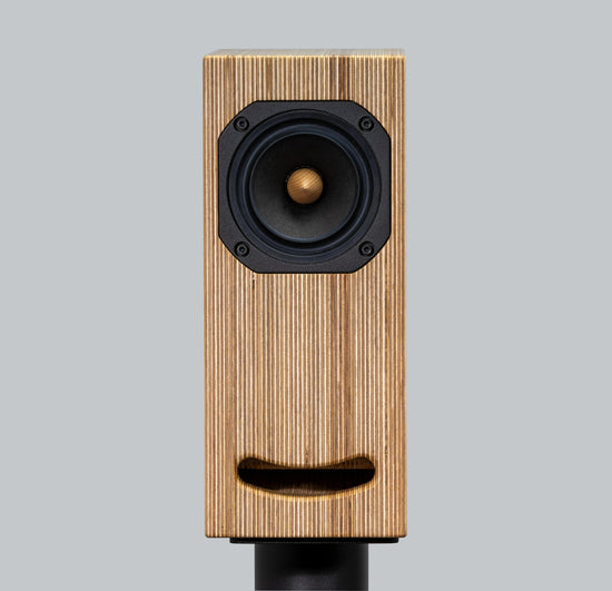 smile loudspeaker on black stand