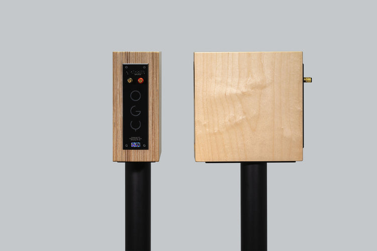 plywood loudspeaker on black stand